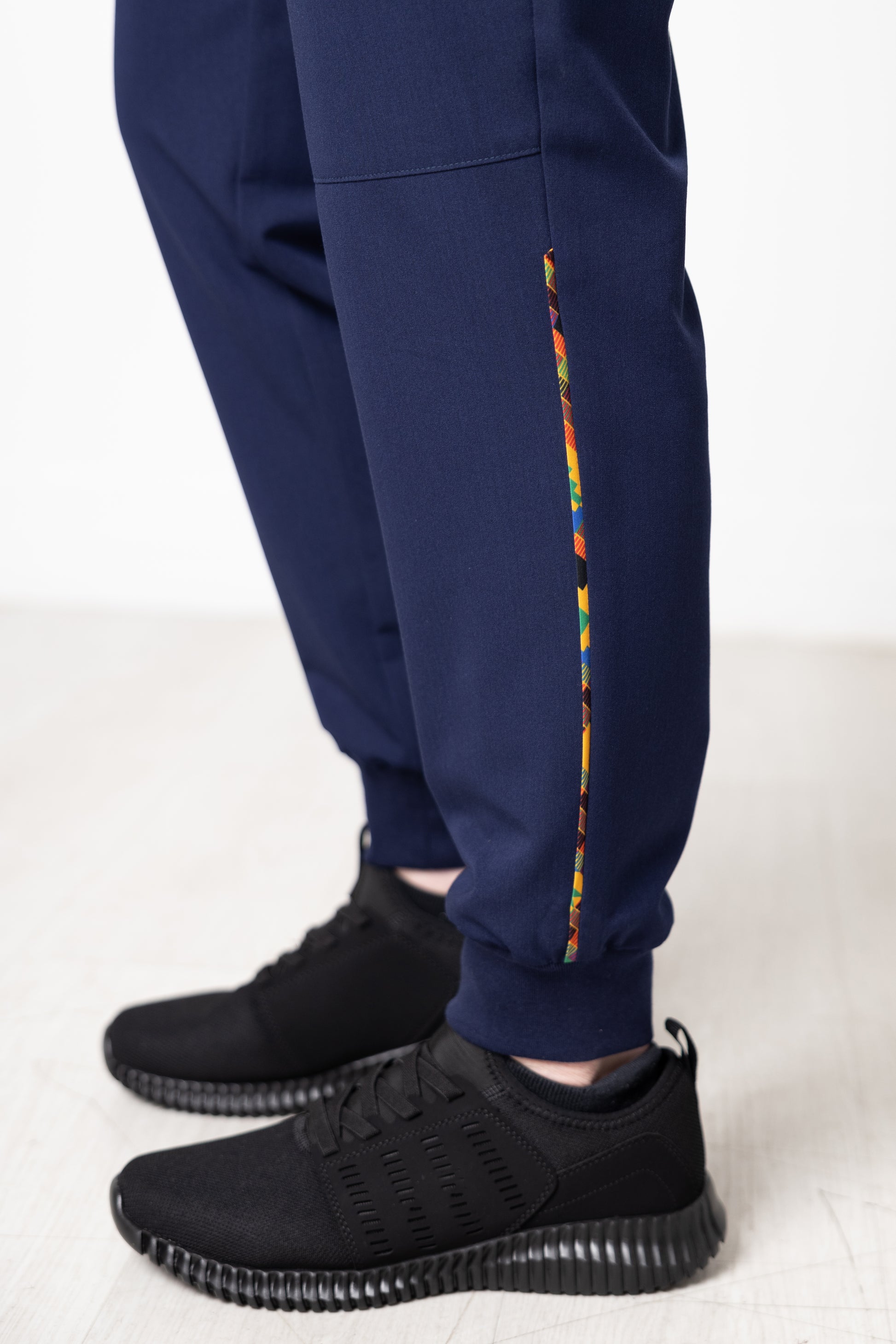 Ohemaa Women Scrub Joggers - Navy, Kente trimmed - close up of bottom