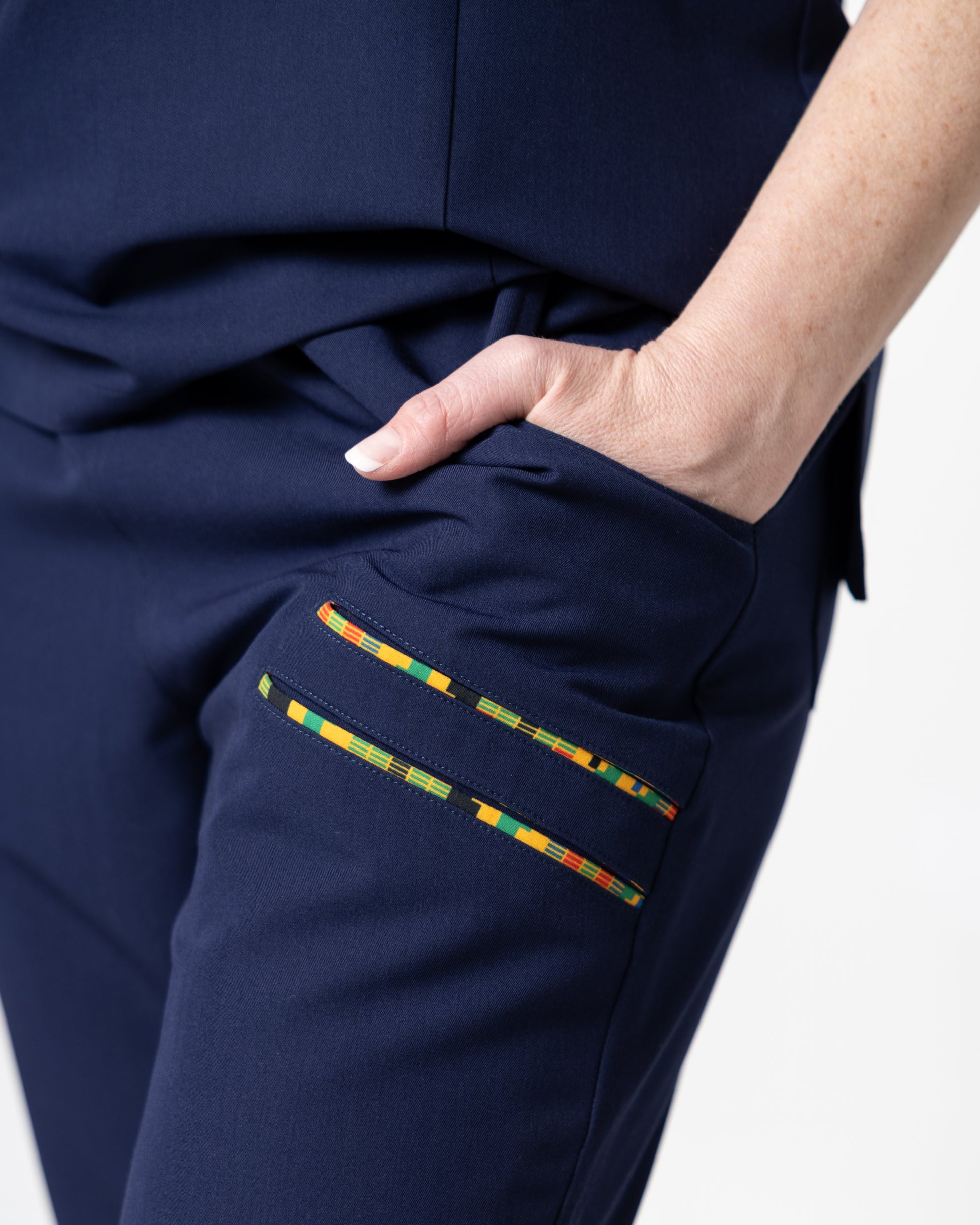 Ohemaa Women Scrub Joggers - Navy, Kente trimmed -hand in pocket