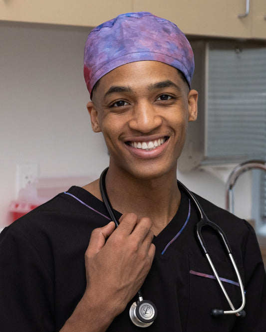 ENDYS Aurora unisex scrub cap — satin-lined, built-in sweatband, adjustable tie-back, subtle watercolor print