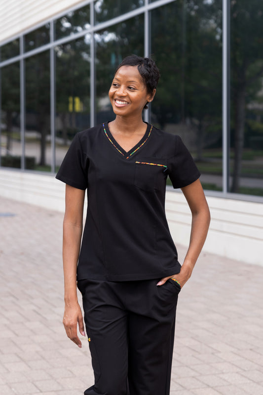 ENDYS Heritage Pop women's black scrub top side view — moisture-wicking, tagless, relaxed fit for long shifts