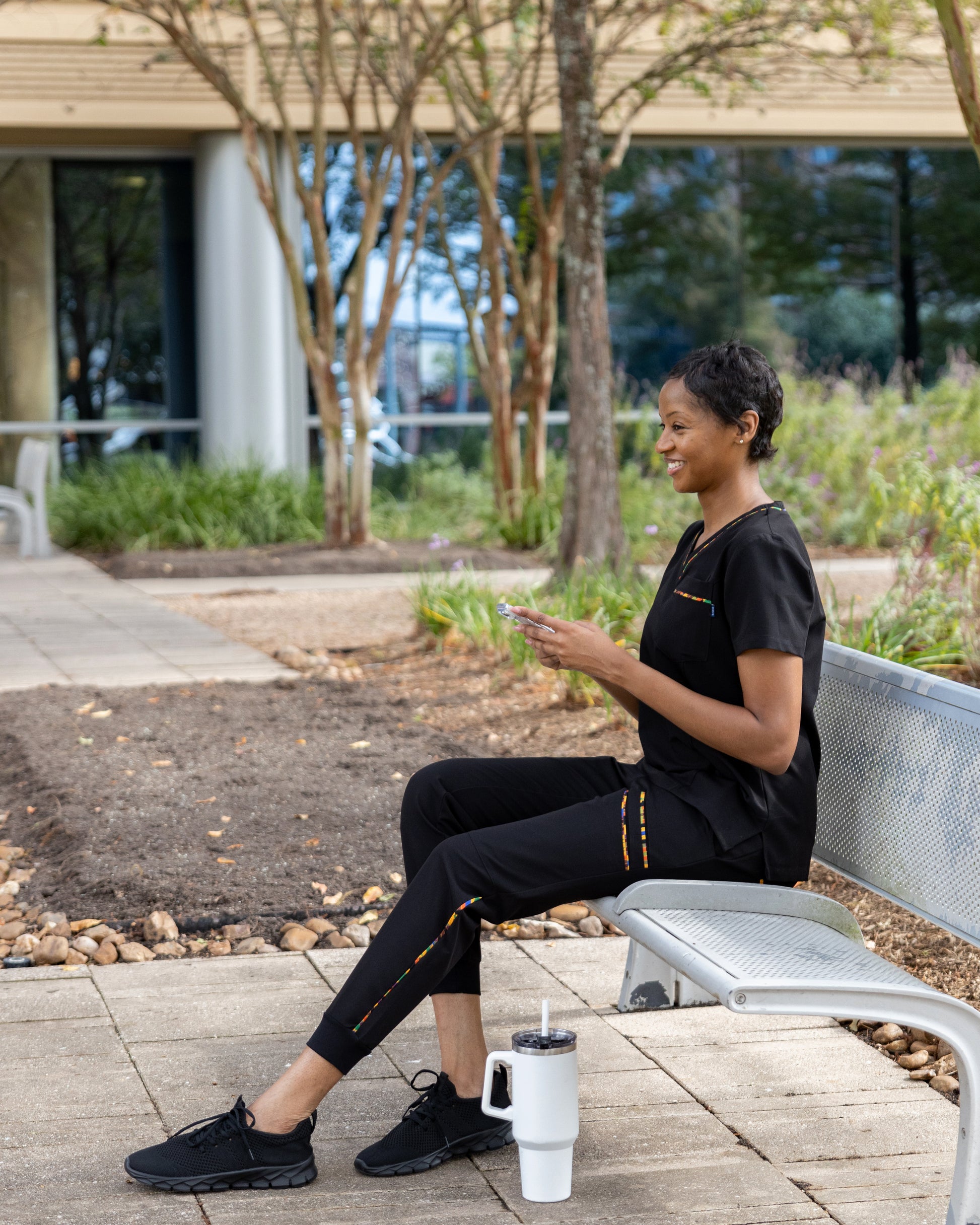 Black Heritage Pop women's scrub joggers by Endys Apparel, comfortable medical scrubs with a relaxed fit and stylish design.