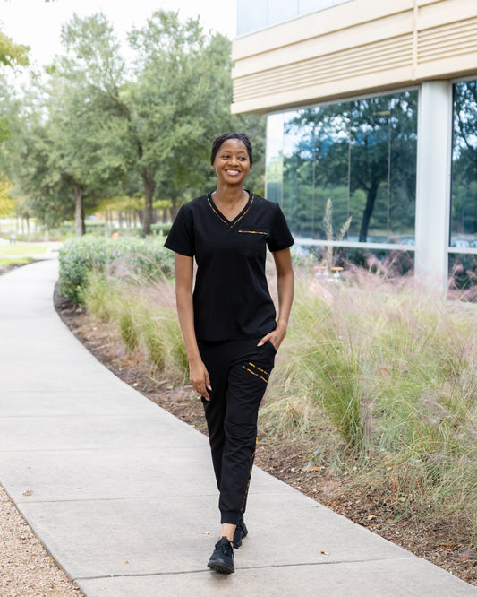 ENDYS Heritage Pop women's black scrub joggers — tapered leg, ribbed ankle cuffs, Heritage Pop print detail