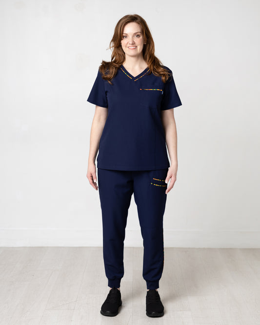 ENDYS Heritage Pop women's navy scrub joggers — tapered leg, ribbed ankle cuffs, Heritage Pop print waistband