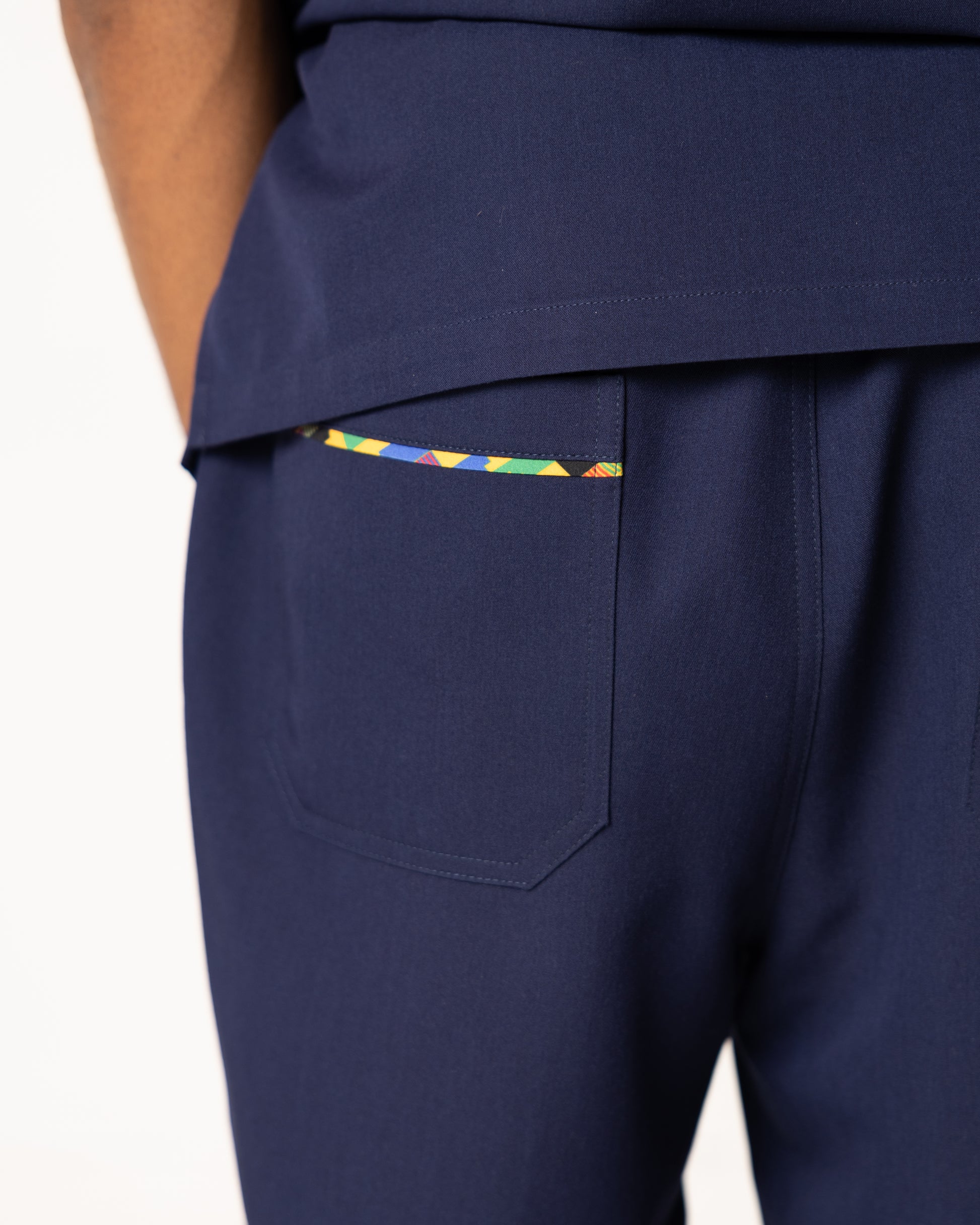 ENDYS Heritage Pop men's navy scrub pants back view — reinforced stitching, functional back and cargo pockets